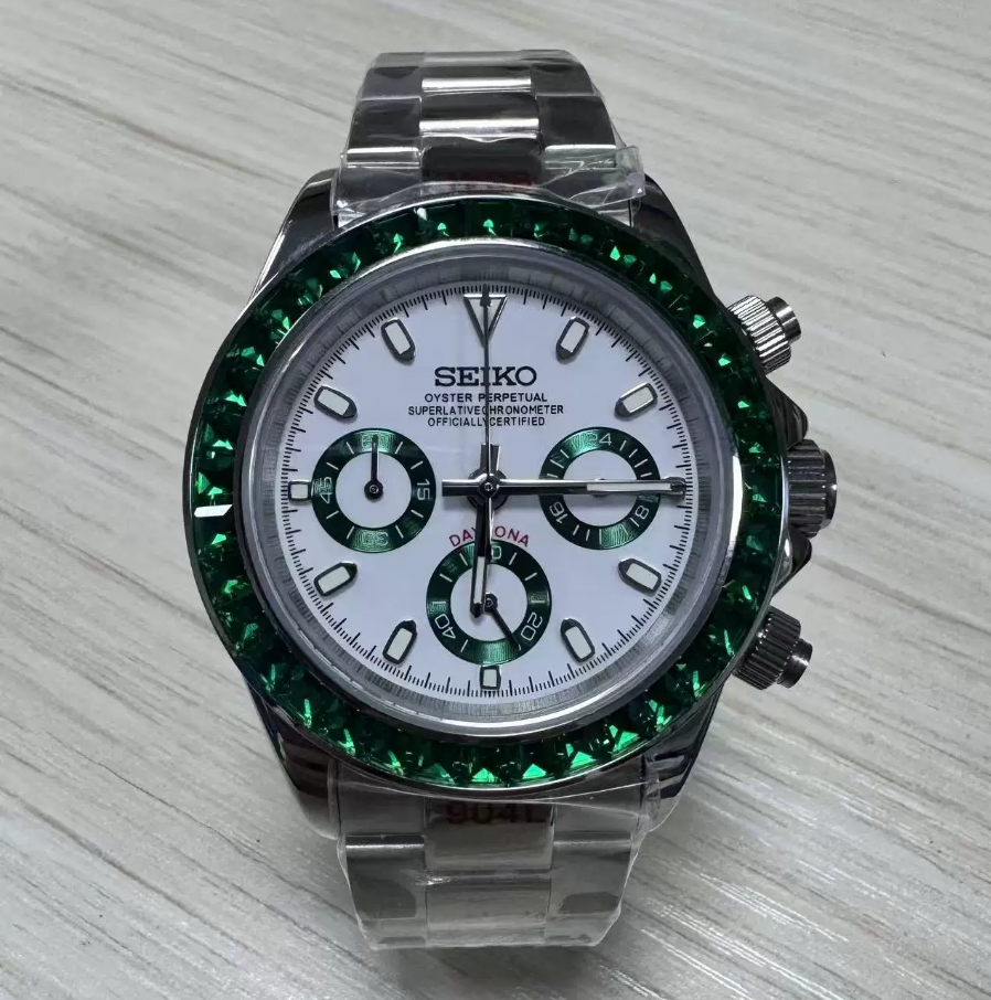 Daytona Emerald Panda — Steel case, green stone-set bezel, white panda dial