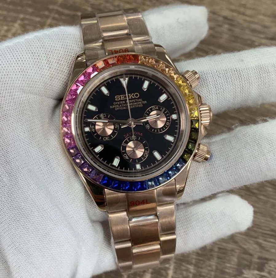 Daytona Rainbow Rose — Rose gold case, rainbow stone-set bezel, black dial