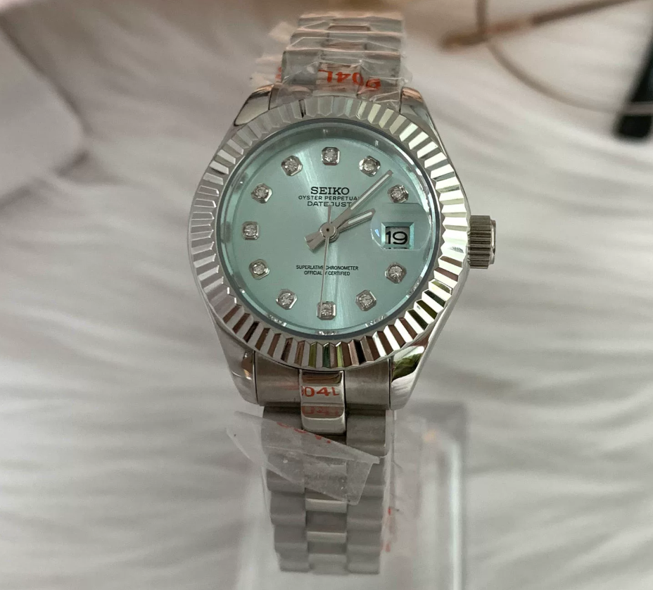 Datejust 28 Glacier — 28mm case, fluted bezel, ice blue diamond-set dial