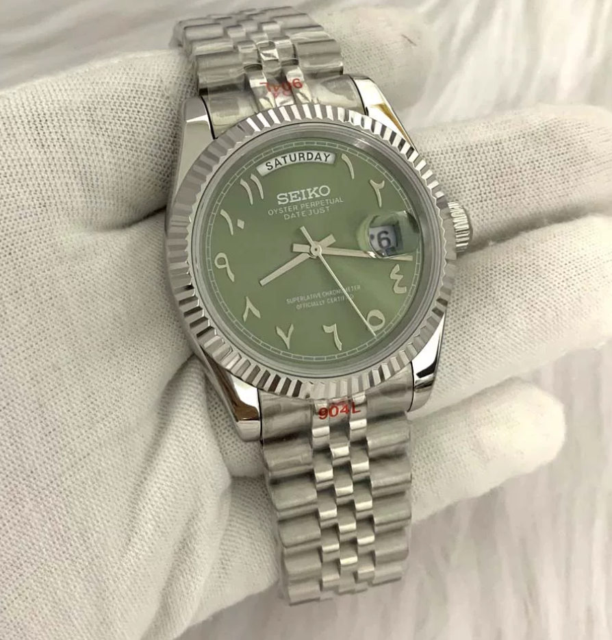 Day-Date Olive — Fluted bezel, jubilee bracelet, olive green dial