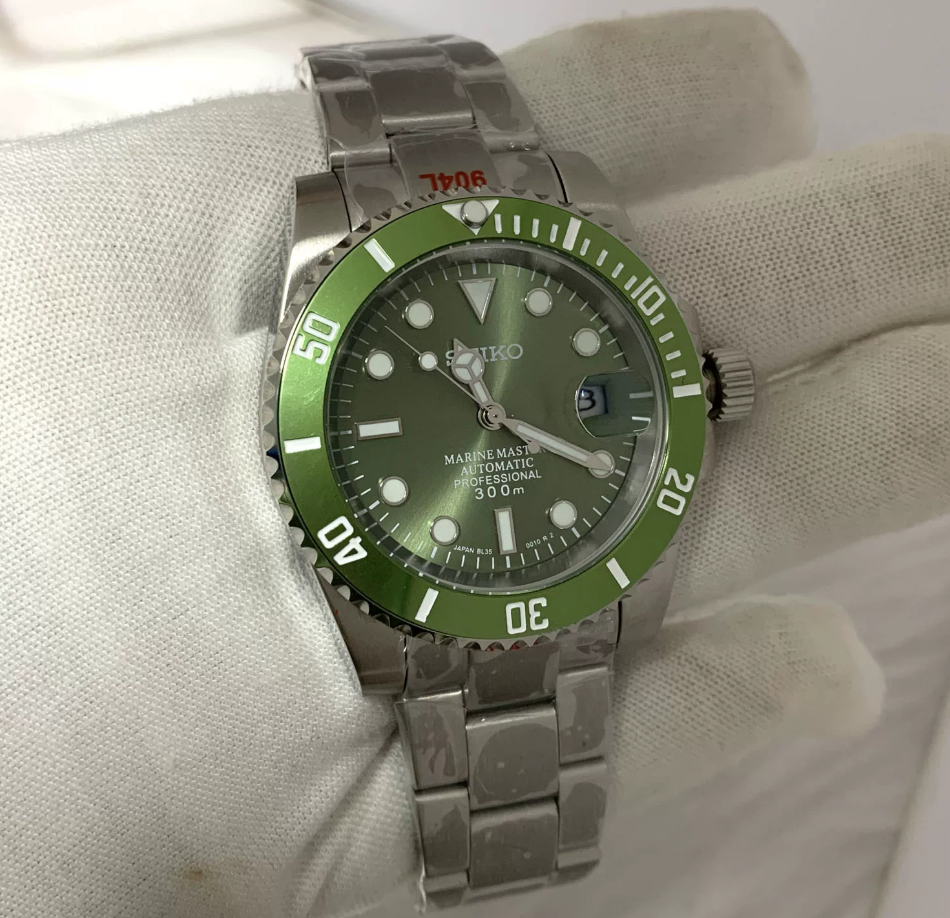 GMT Fern — Bright green bezel, fern sunburst dial