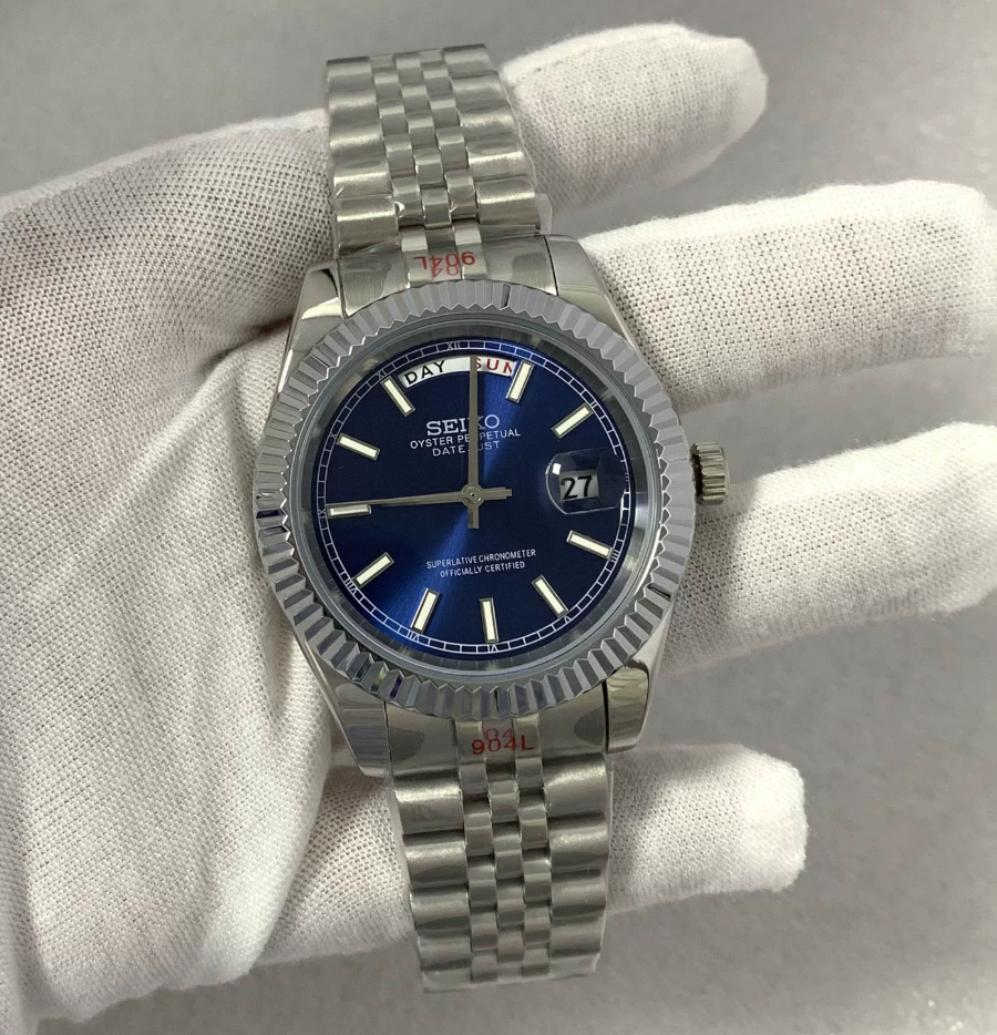 Day-Date Sapphire — Fluted bezel, jubilee bracelet, deep blue dial