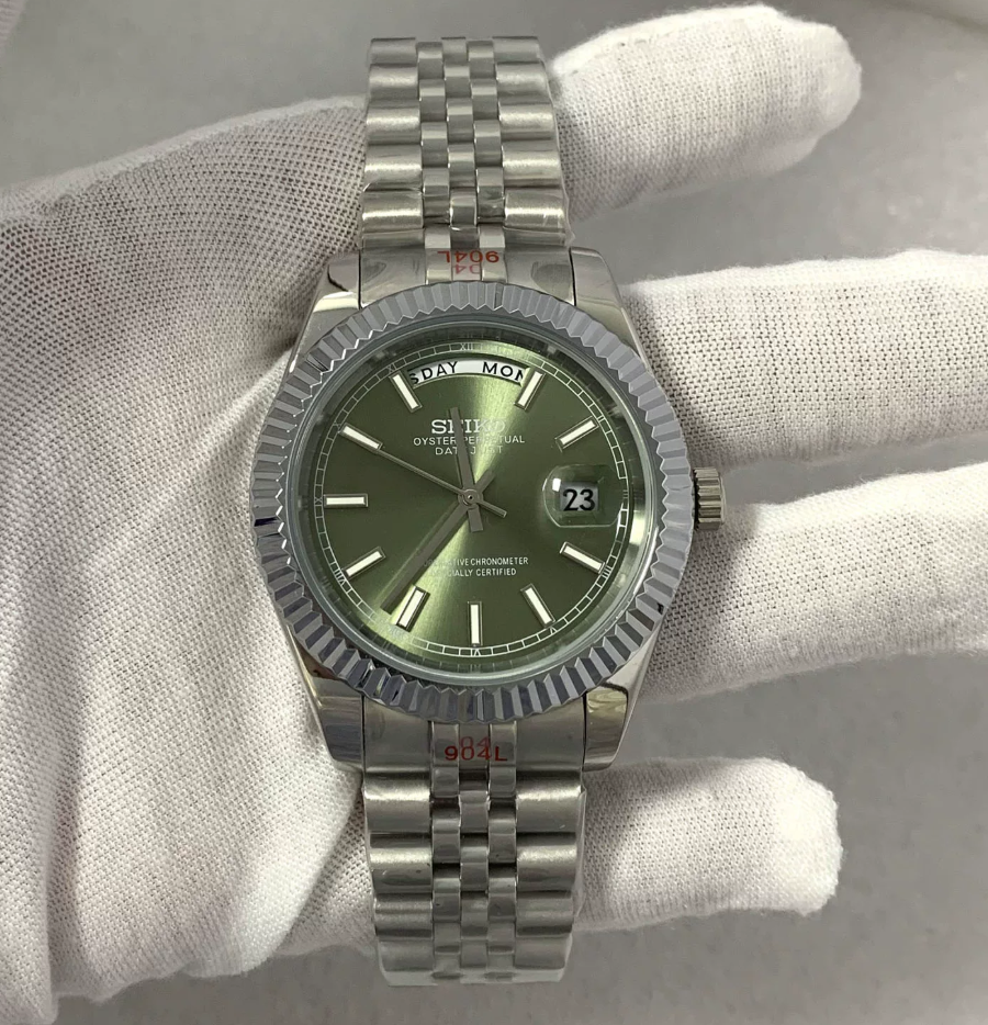 Day-Date Sage — Fluted bezel, jubilee bracelet, sage green dial