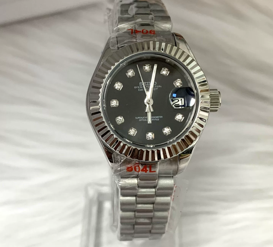 Datejust 28 Onyx — 28mm case, fluted bezel, black diamond-set dial