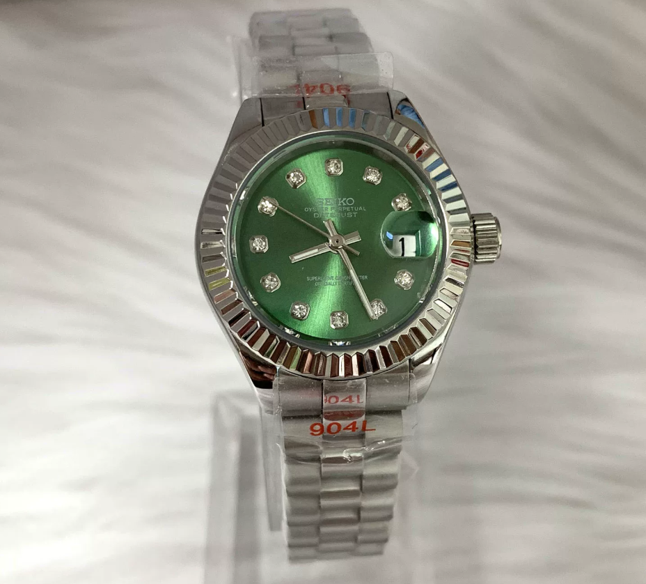 Datejust 28 Emerald — 28mm case, fluted bezel, green diamond-set dial