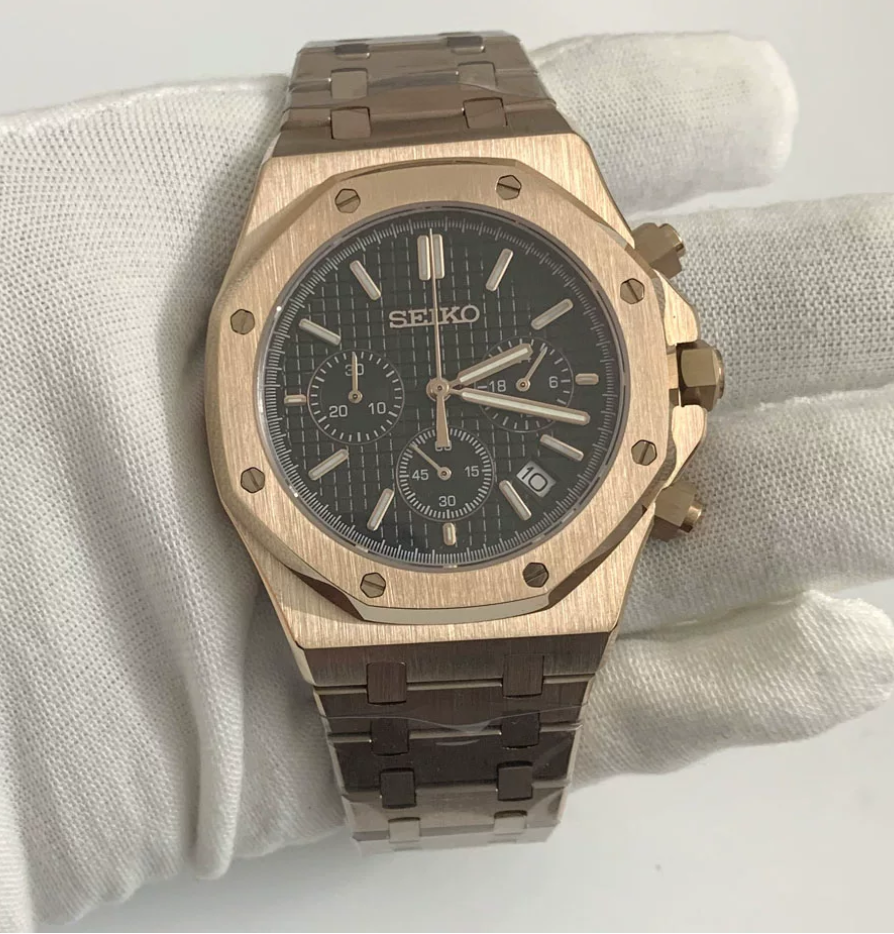 Octagon Aurum — Rose gold case, black tapisserie dial