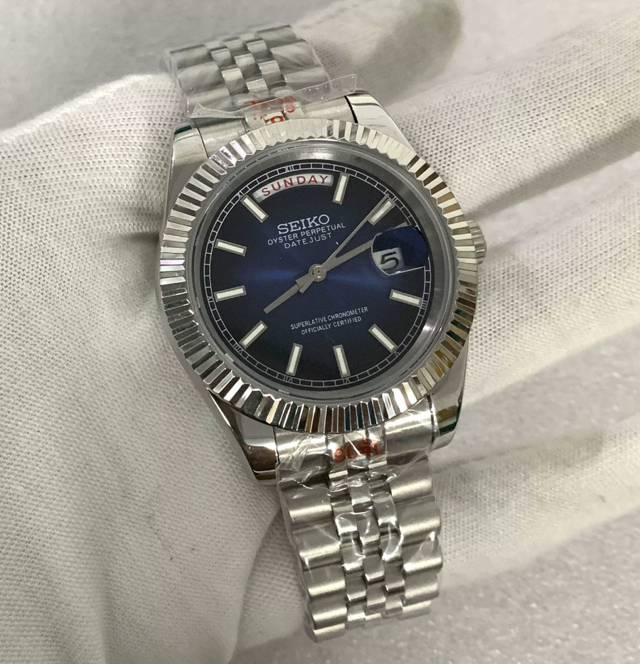Day-Date Cobalt — Fluted bezel, jubilee bracelet, cobalt sunburst dial