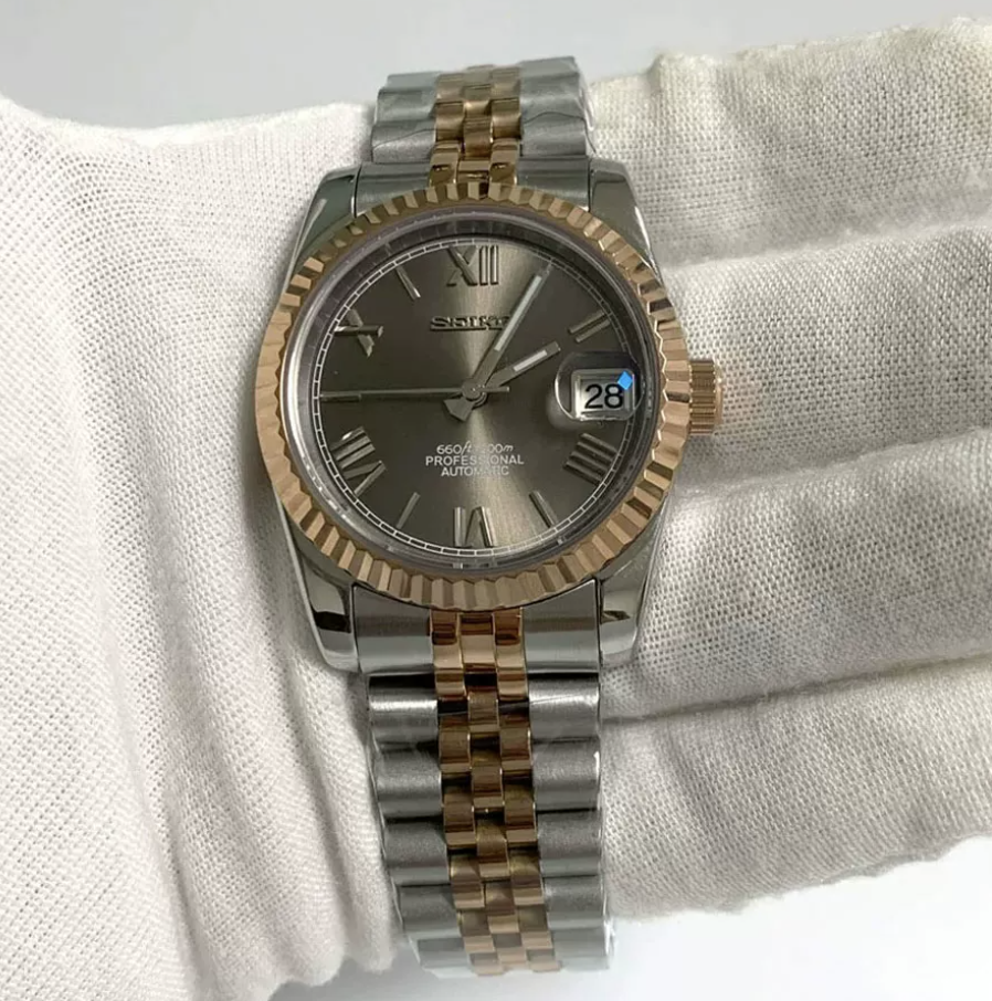 Datejust Two-Tone Slate — Two-tone rose gold, fluted bezel, slate Roman dial