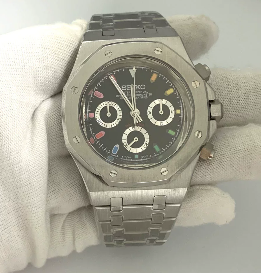 Octagon Spectrum — Steel case, black dial with pastel colour indices